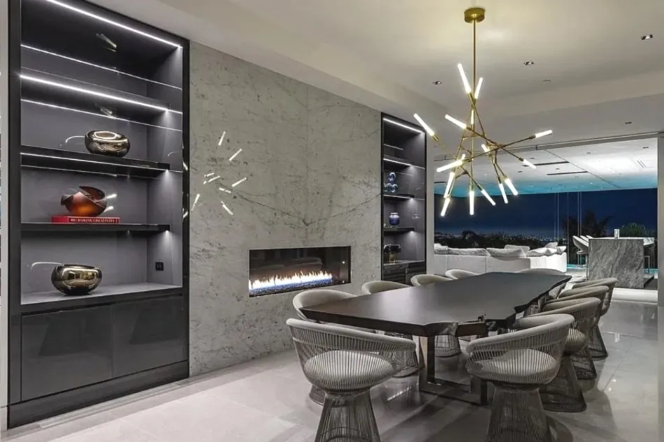 Floor-to-ceiling walnut built-in with integrated lighting at the Doheny Residence